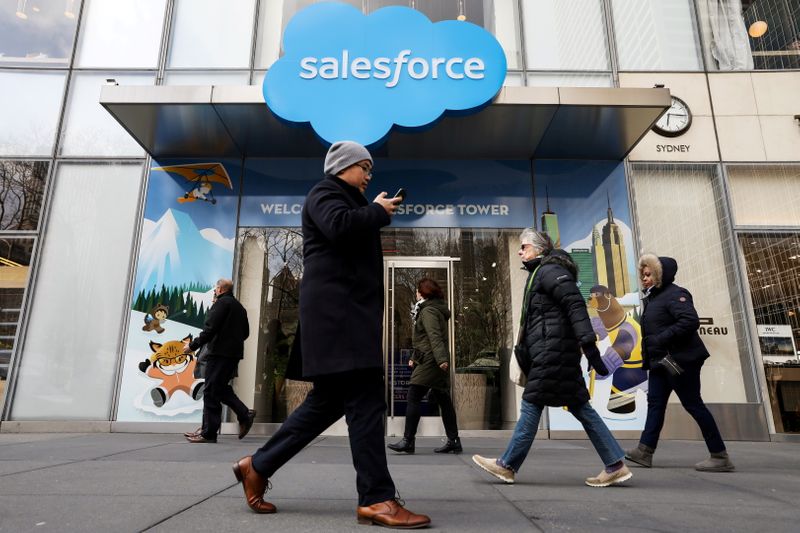 FILE PHOTO: People pass by the Salesforce Tower and Salesforce.com