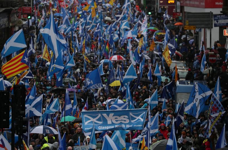 FILE PHOTO: Demonstrators march for Scottish Independence through Glasgow City