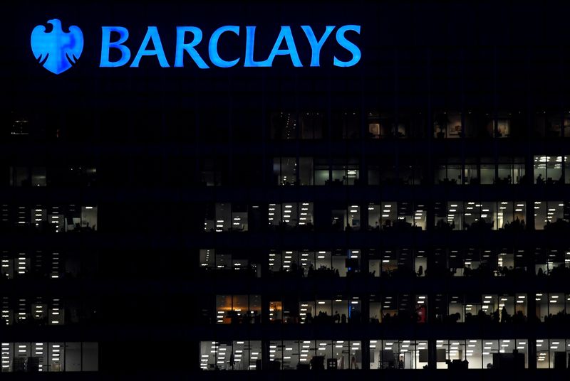 FILE PHOTO: Workers are seen at Barclays bank offices in