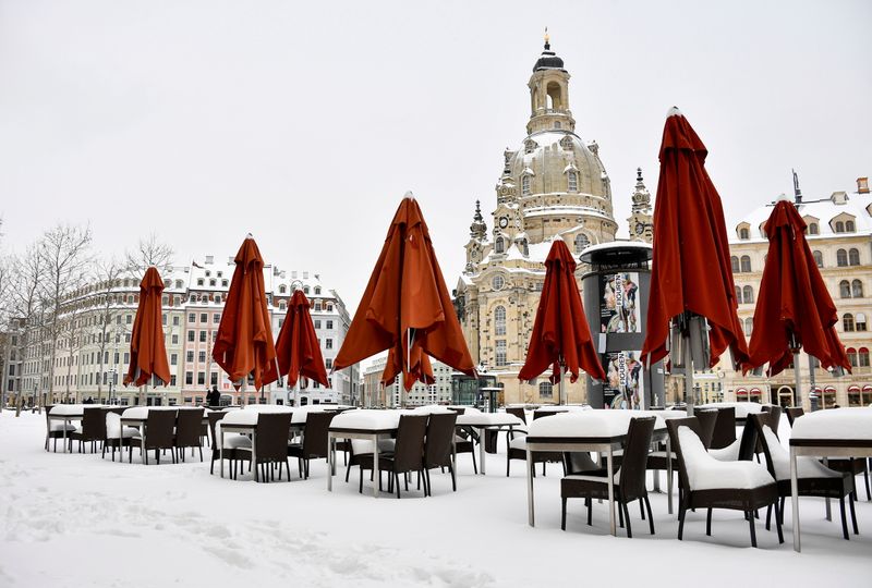 FILE PHOTO: Snow covered restaurant tables in Dresden