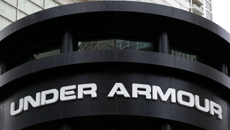 An Under Armour sign is seen outside a store in