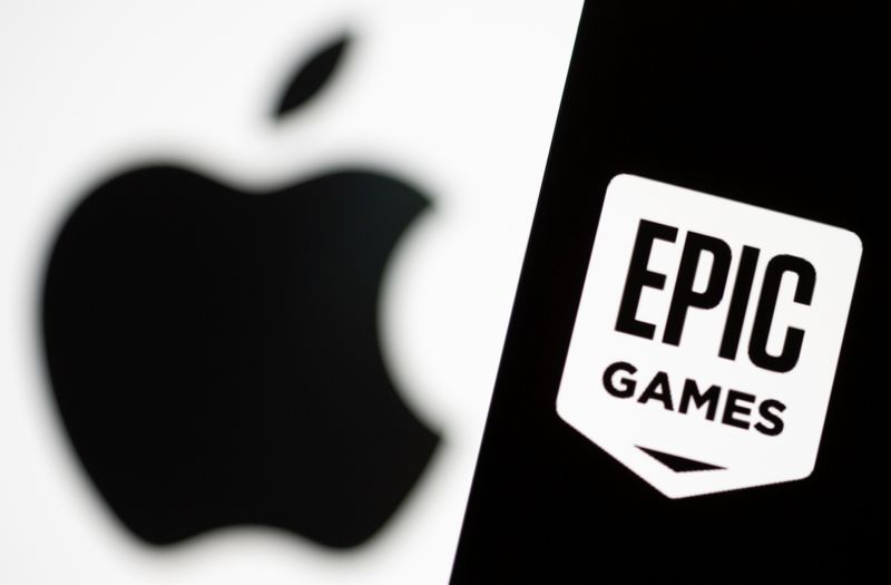 Smartphone with Epic Games logo is seen in front of