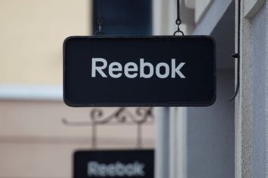 FILE PHOTO: Boards with Reebok store logo are seen on