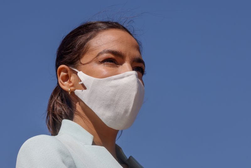 U.S. Representative Ocasio-Cortez leads a news conference to re-introduce the