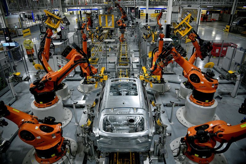 Autonomous robots assemble an X model SUV at the BMW