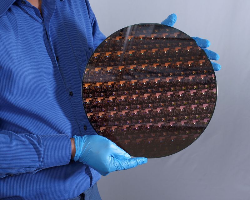 Handout photo of a silicon wafer containing chips made with