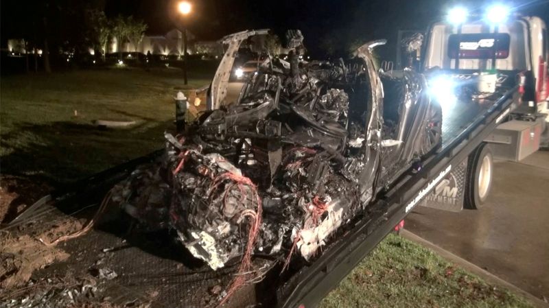 FILE PHOTO: The remains of a Tesla vehicle are seen