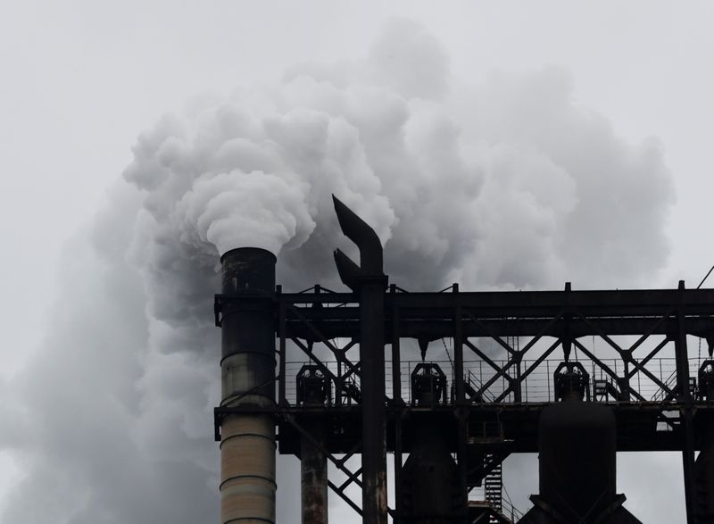 FILE PHOTO: A chimney of Nippon Steel & Sumitomo Metal