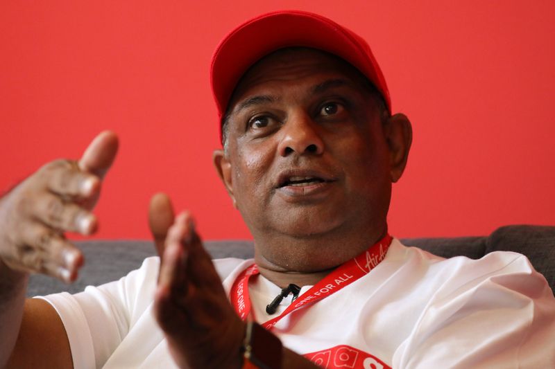 AirAsia Group CEO Tony Fernandes reacts during an interview in