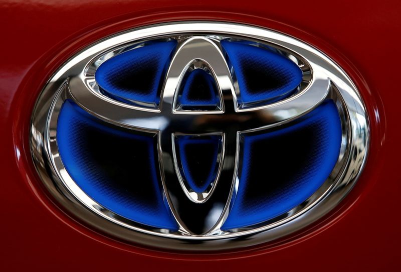 FILE PHOTO: Toyota Motor Corp’s logo on Estima Hybrid model