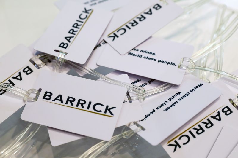 Souvenir luggage tags are displayed at a Barrick Gold Corp