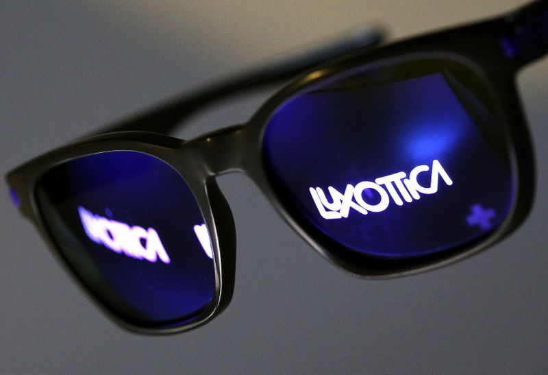 FILE PHOTO: FILE PHOTO: The Luxottica name is reflected in