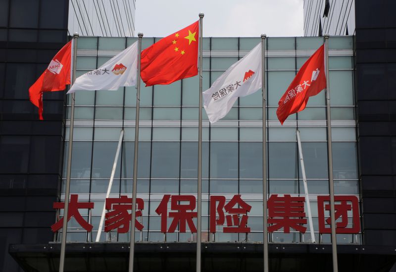 Company flags and the sign of Dajia Insurance Group are