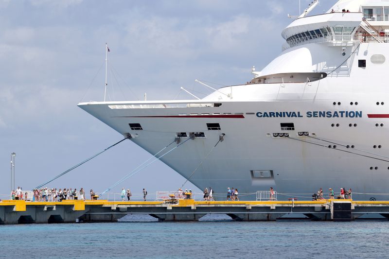 FILE PHOTO: Passengers of the Carnival Sensation, operated by Carnival