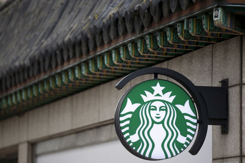 A Starbucks logo is seen at a Starbucks coffee shop