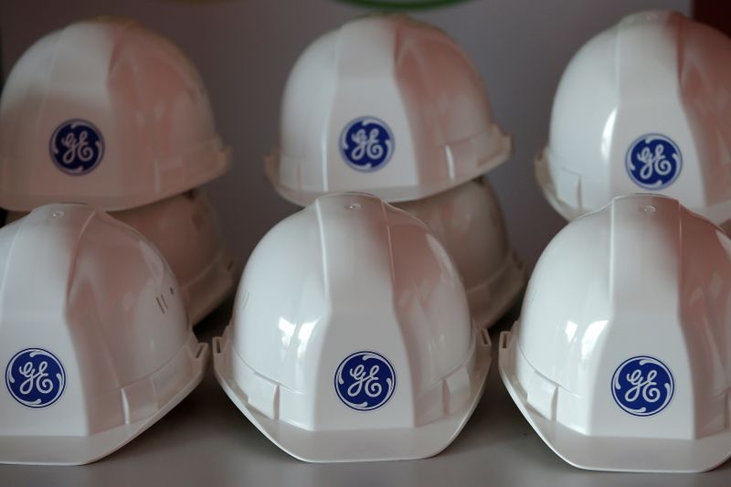 FILE PHOTO: The General Electric logo is pictured on working