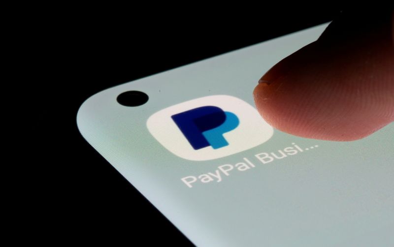 FILE PHOTO: FILE PHOTO: PayPal app is seen on a