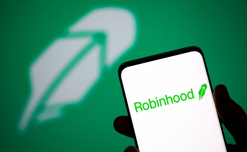 Robinhood logo is seen on a smartphone in front of