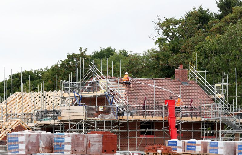 Construction workers build a new house in Berkhamsted