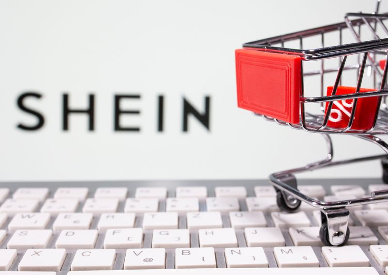 A keyboard and a shopping cart are seen in front