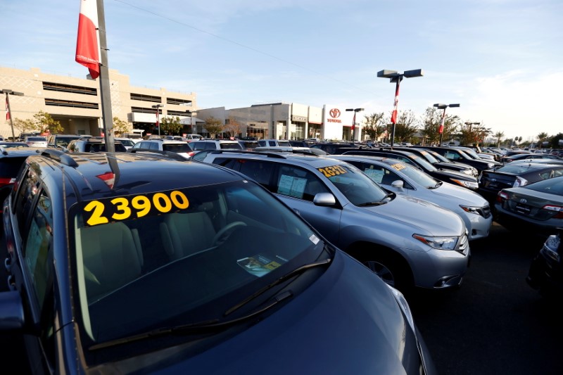 FILE PHOTO: Vehicles for sale are pictured on the lot