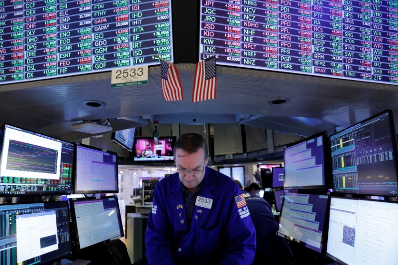FILE PHOTO: A trader works on the trading floor at