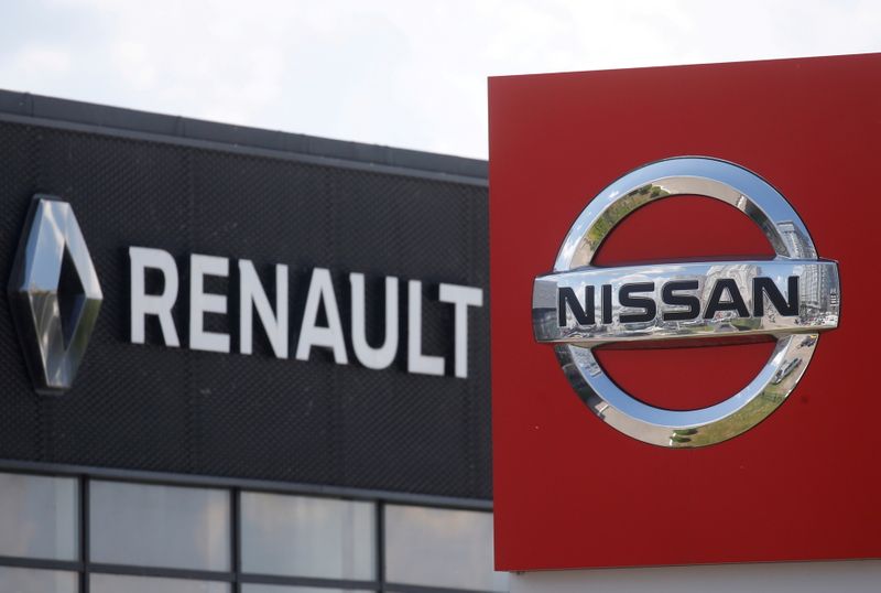 FILE PHOTO: The logos of car manufacturers Nissan and Renault