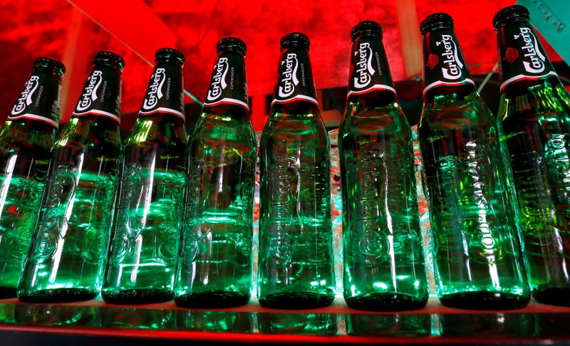 FILE PHOTO: Bottles of Carlsberg beer are seen in a