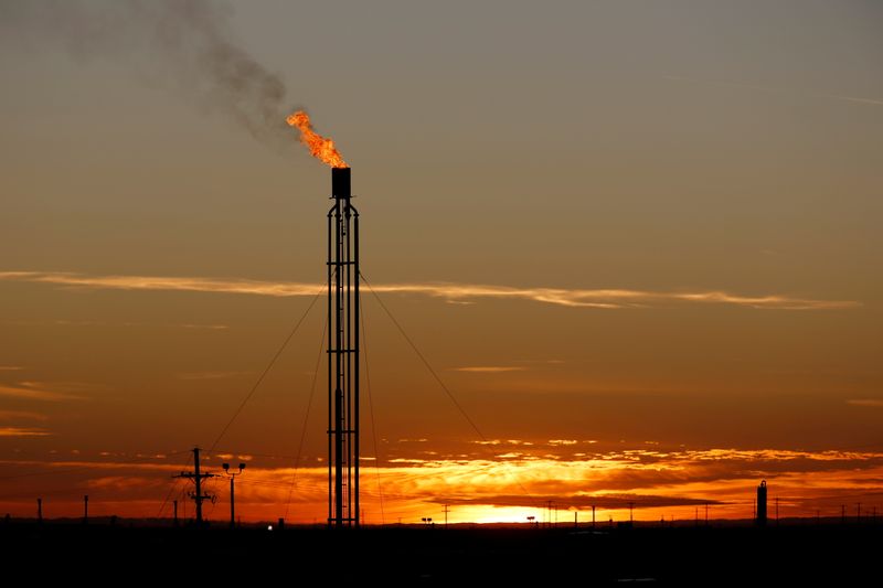 FILE PHOTO: A flare burns excess natural gas in the