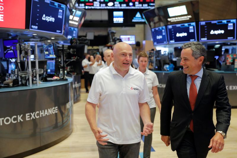 Spire CEO Peter Platzer walks on the trading floor of