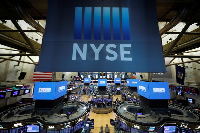 Signage hangs over the trading floor at the New York