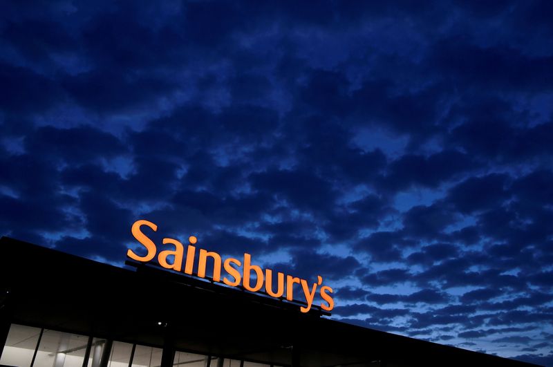 FILE PHOTO: FILE PHOTO: Signage for Sainsbury’s is seen at