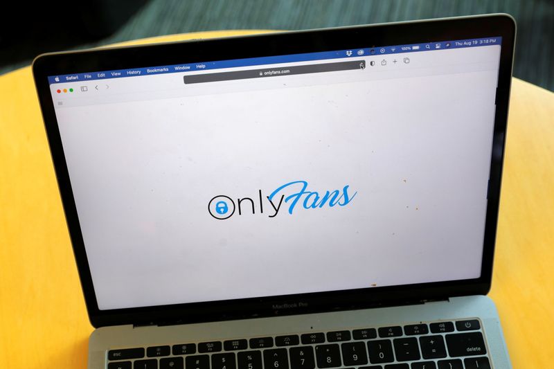 The logo for OnlyFans is seen on a device in