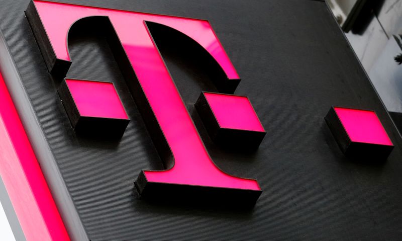 The logo of T-Mobile Austria is seen outside of one