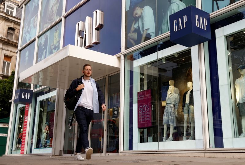 A man walks past a Gap store on Oxford Street
