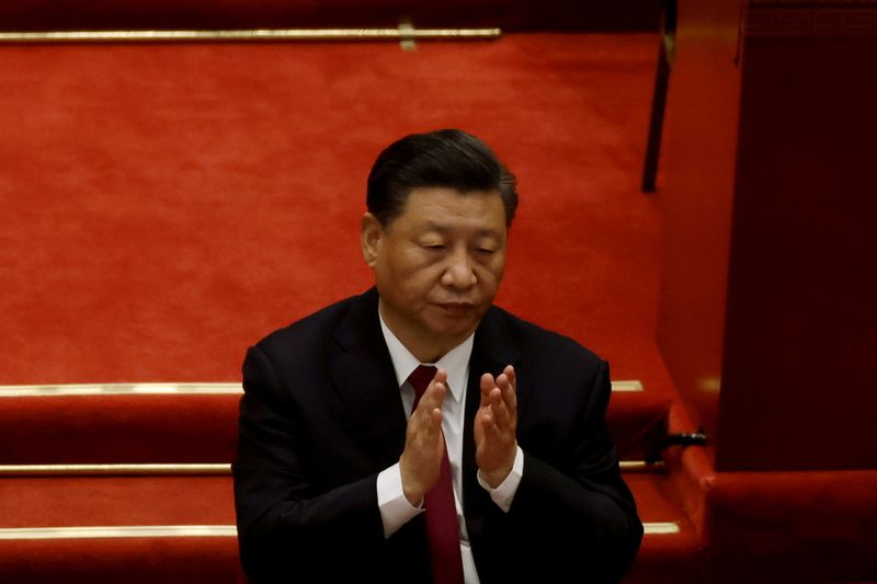 FILE PHOTO: Chinese President Xi Jinping applauds at the opening