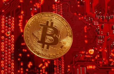 FILE PHOTO: Representation of cryptocurrency Bitcoin is placed on PC