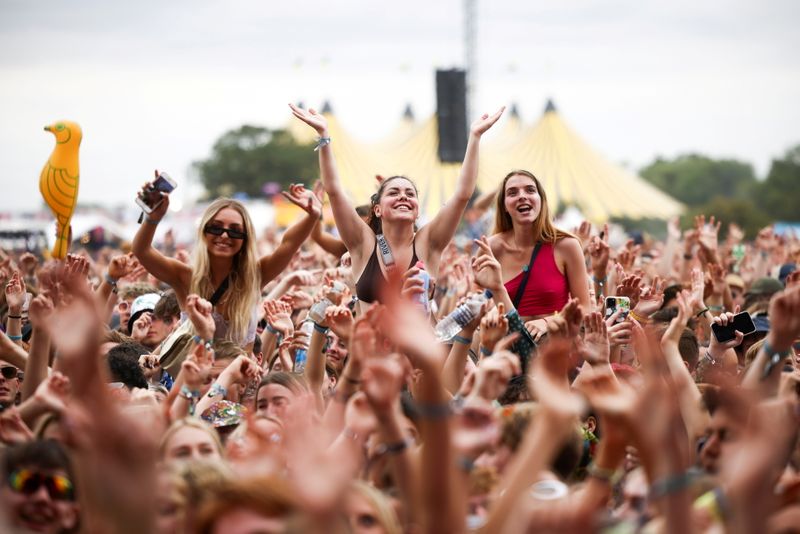 FILE PHOTO: Festival goers watch Declan McKenna perform on the