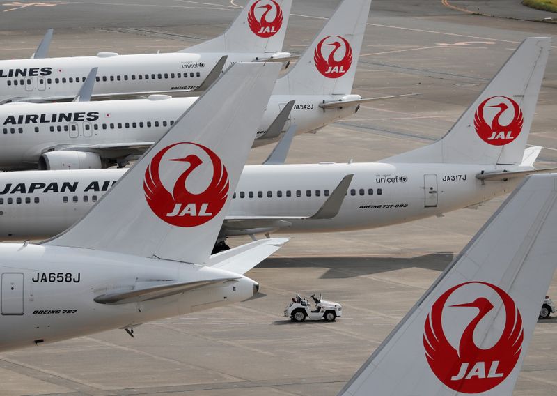 FILE PHOTO: Japan Airlines’ (JAL) airplanes are seen, amid the