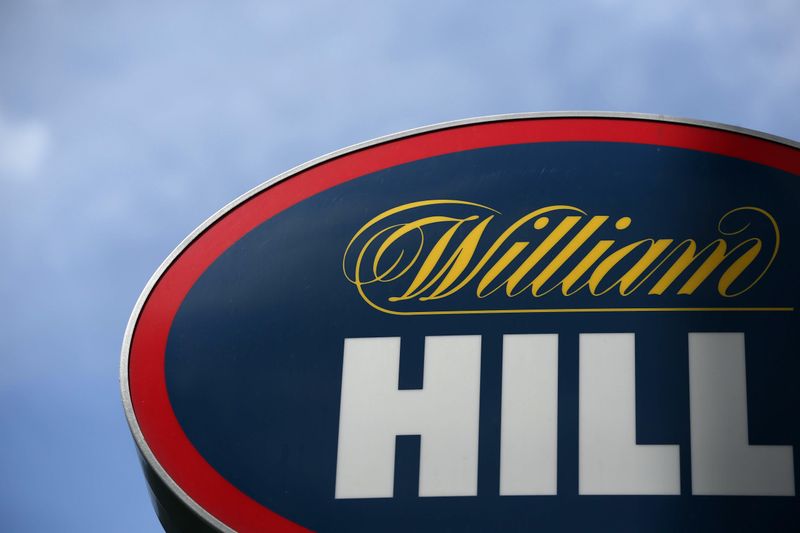 A branded sign is displayed outside a William Hill betting