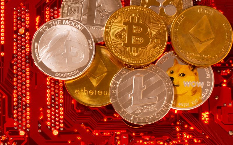 Representations of cryptocurrencies Bitcoin, Ethereum, DogeCoin, Ripple, Litecoin are placed