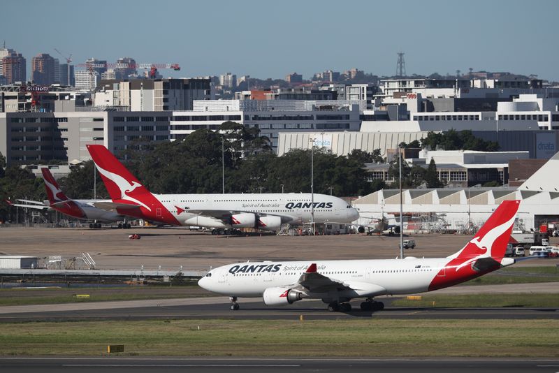 Qantas planes are seen at Kingsford Smith International Airport in