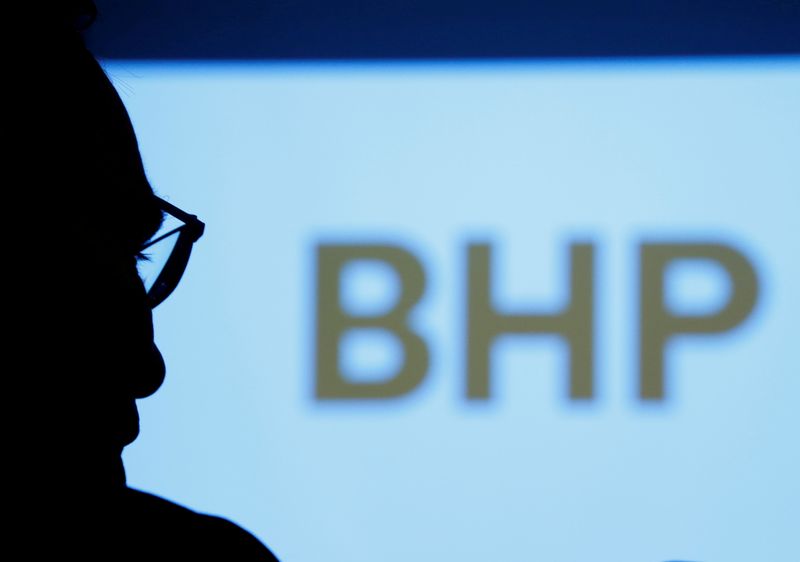 FILE PHOTO: BHP’s logo is projected on a screen during