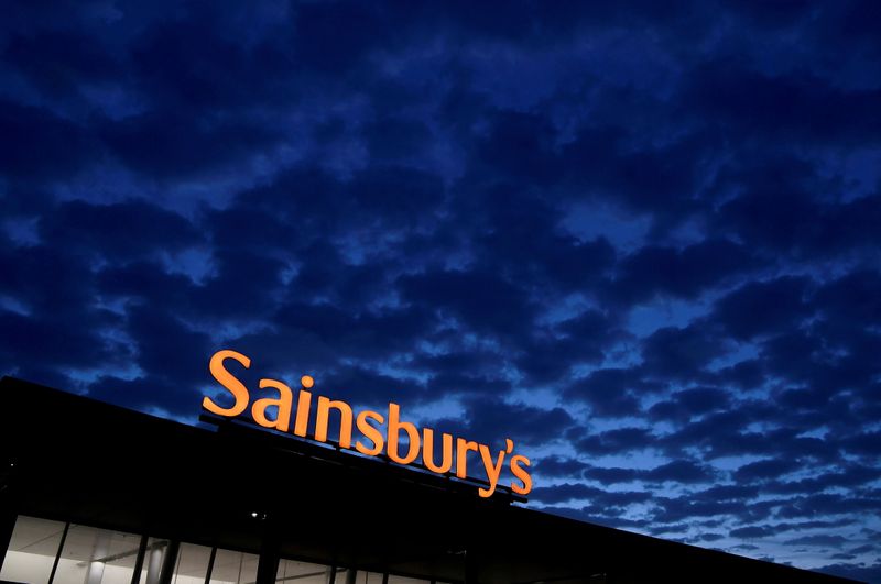 FILE PHOTO: Signage for Sainsbury’s is seen at a branch