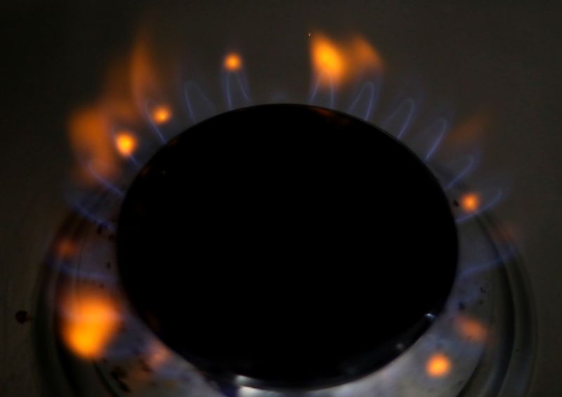 Flames come out of a domestic gas ring on a