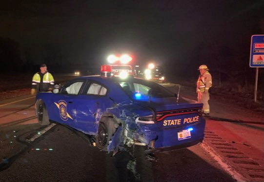 A crashed state police car is seen in Eaton County