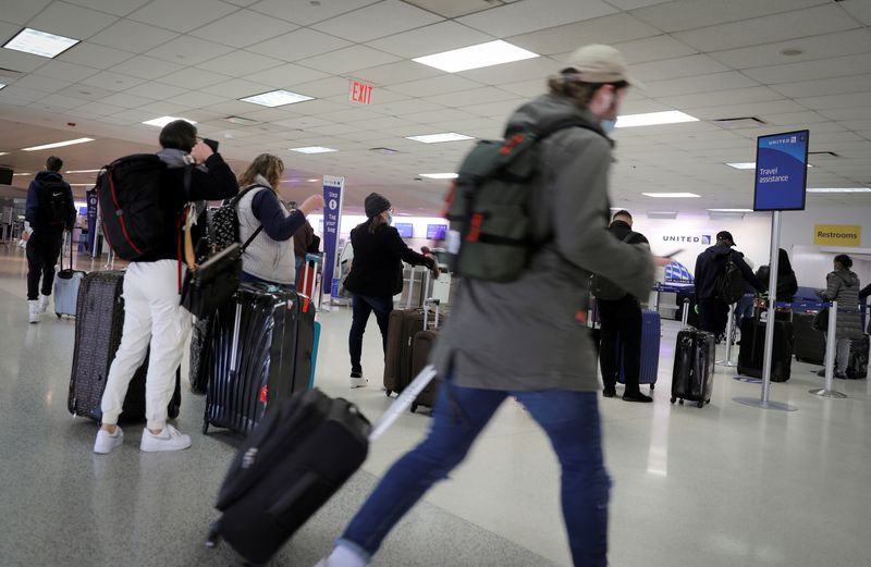 FILE PHOTO: Travelers at Newark International Airport ahead of Thanksgiving