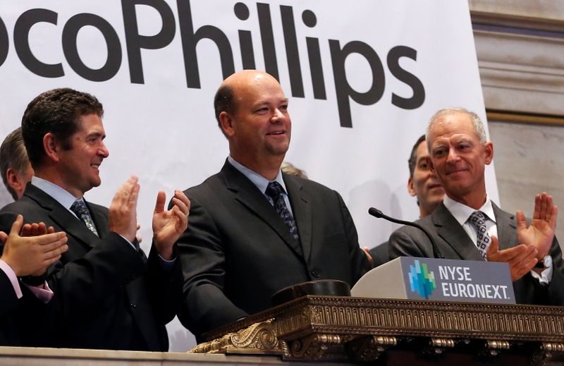 FILE PHOTO: ConocoPhillips Chairman and CEO Lance rings the closing