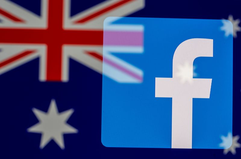 FILE PHOTO: Facebook logo and Australian flag are displayed in