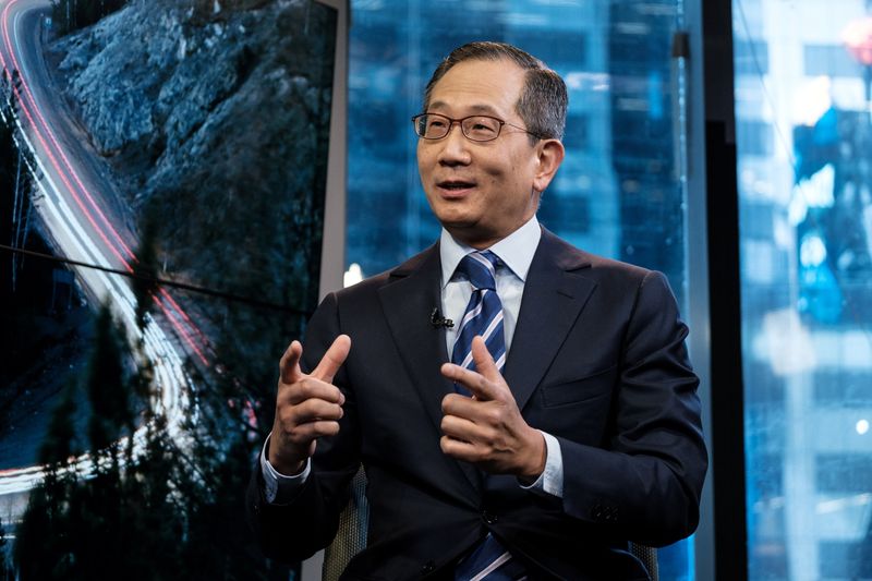 Carlyle Group CEO Kewsong Lee speaks during a Reuters Newsmaker